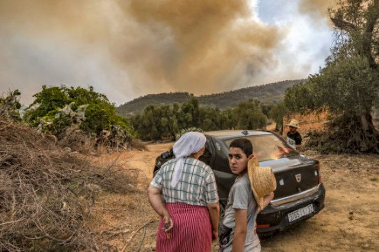 Morocco firefighters battle blazes as villagers flee