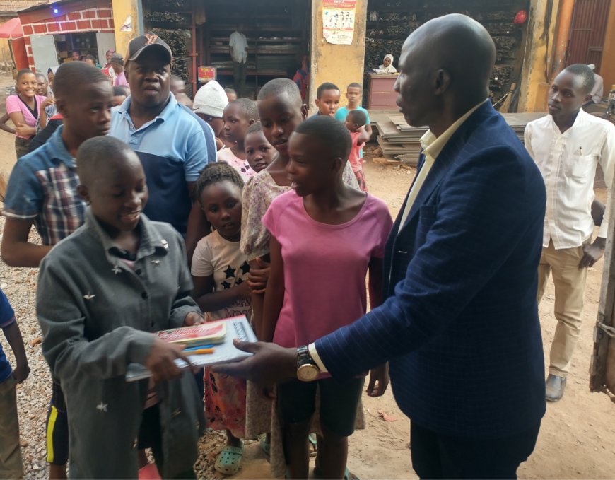 NRM Chairperson at LC1 Level Donates Scholastic Materials To Children As Schools Resume