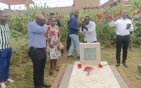 Dr. Muganga Visits Parents’ Graves to Affirm Ugandan Roots Amid Citizenship Controversy